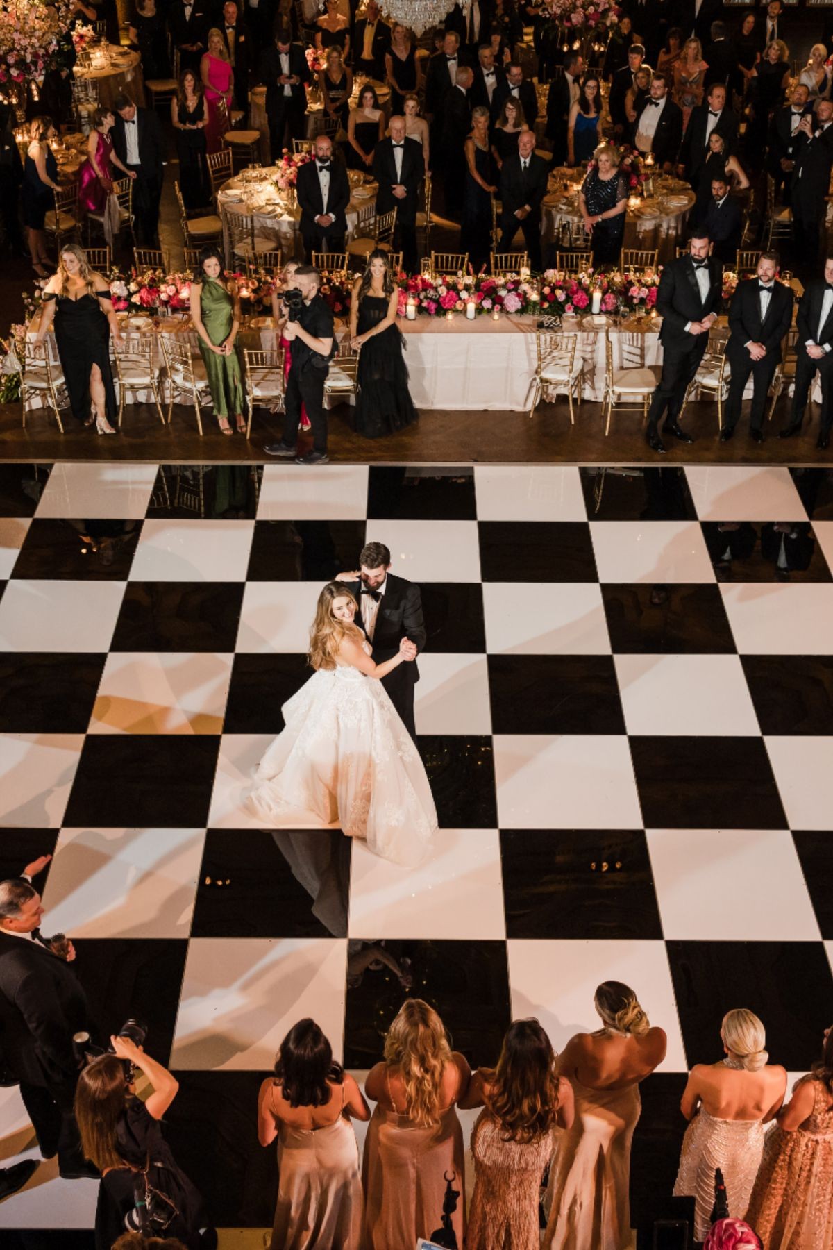 Black and white checkerboard dance floor rental set up for a St. Louis wedding reception