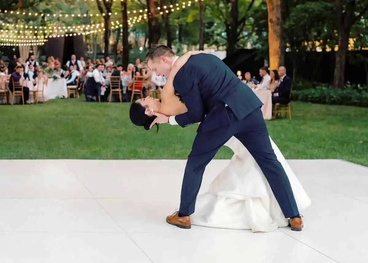 Solid black and white dance floor set up at a St. Louis wedding reception